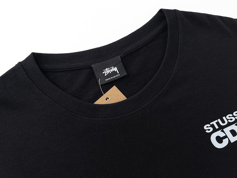 Oversized Stussy CDG Surfman Graphic T-Shirt