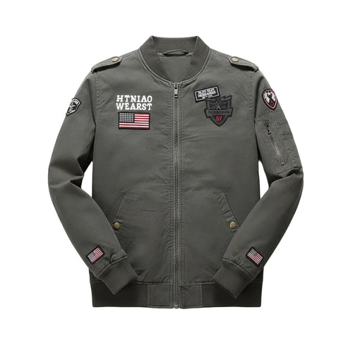 Green jacket with patches on a wooden surface