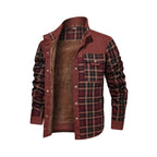 Plaid shirt with brown leather vest on a light gray background